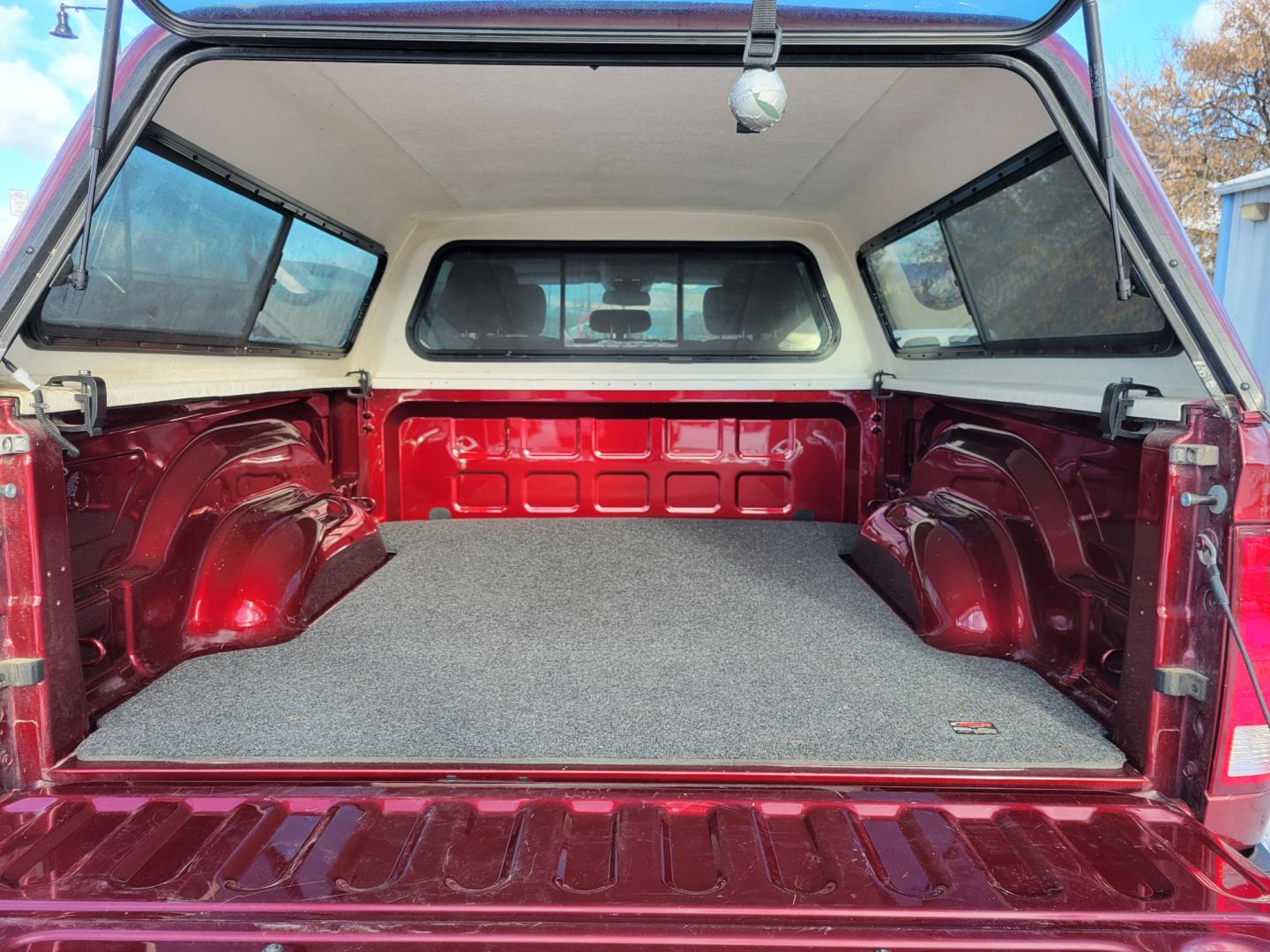 2018 Maroon /Black RAM 2500 SLT (3C6UR5DL4JG) with an 6.7 L Cummins Turbo Diesel engine, 6-Speed Automatic transmission, located at 450 N Russell, Missoula, MT, 59801, (406) 543-6600, 46.874496, -114.017433 - Only 12,839 Miles. Mint Condition/ 4 Wheel Drive. 6.7L Cummins Turbo Diesel. 6 Speed Automatic Transmission. Matching Topper. Touchscreen Display. AM FM Bluetooth. Power Drivers Seat. Air. Cruise. Tilt. Power Windows and Locks. Backup Camera. - Photo#9